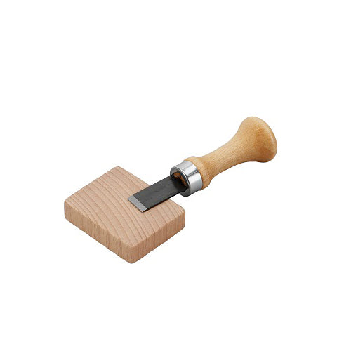 Knopflochstecher mit Holzunterlage